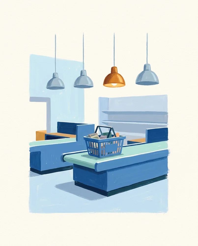 Four lamps hang above empty checkout lanes, with one glowing amber and a shopping basket resting on the nearest conveyor belt.